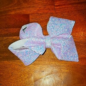 Beautiful girls JoJo Siwa heavy duty large glitter bow. Purple and irredescent